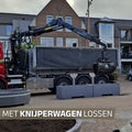 Met knijperwagen lossen